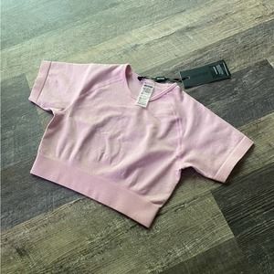 BO+TEE TENACITY Seamless Backless Crop Top In Pink